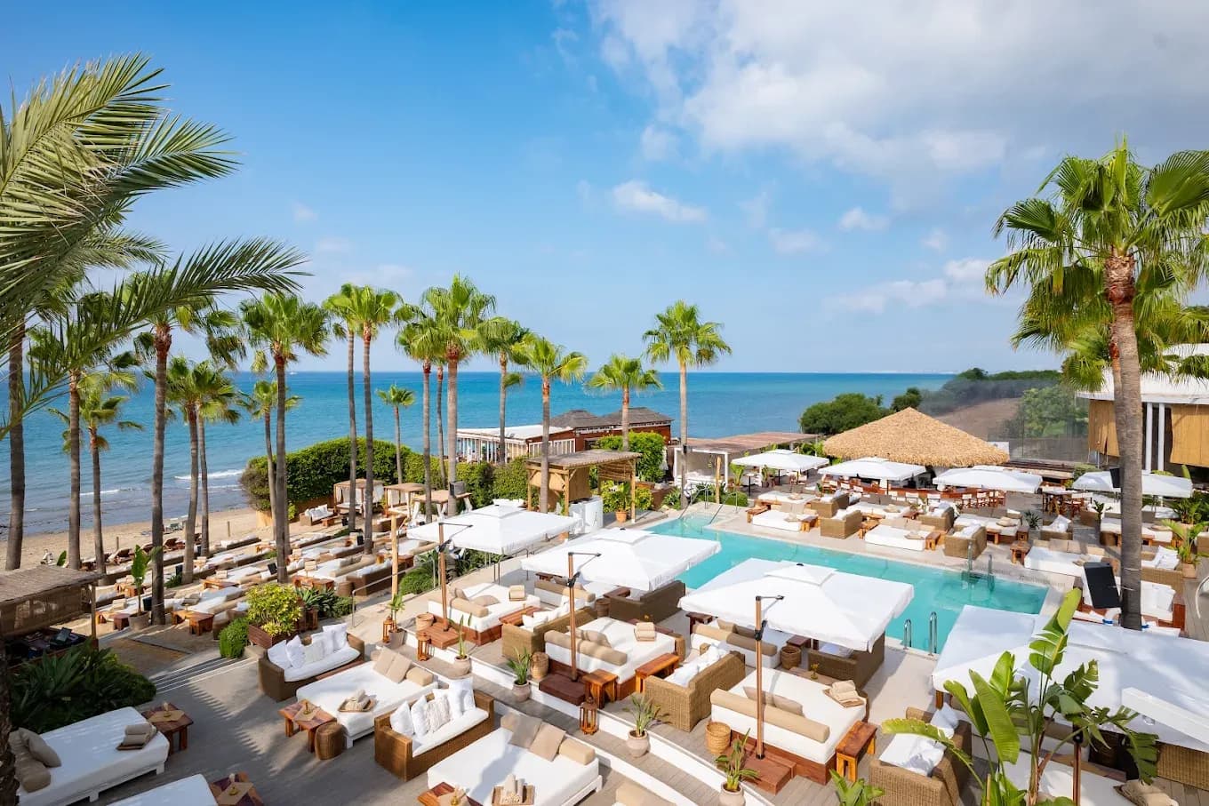 Beach clubs and coastline in Marbella, Spain