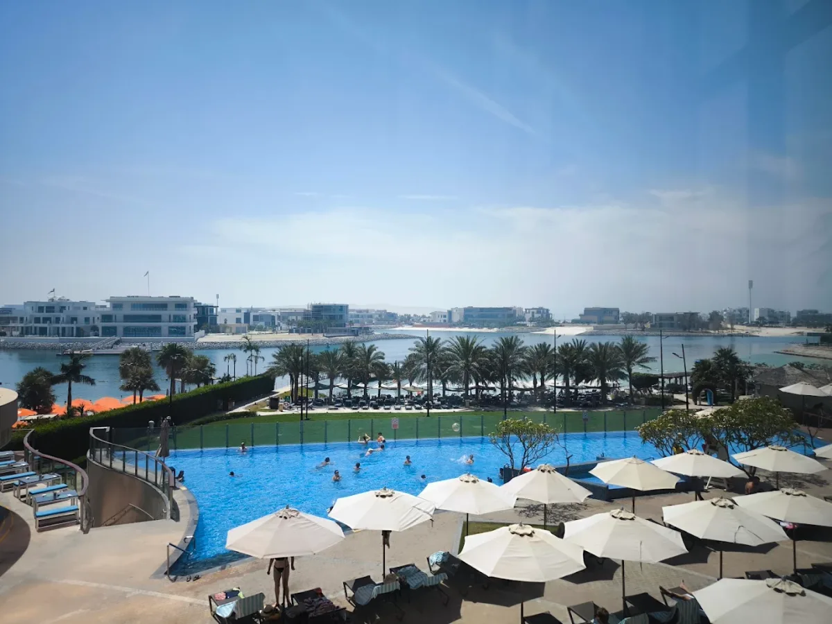 Infinity pool and private beach at Bab Al Qasr, West Corniche