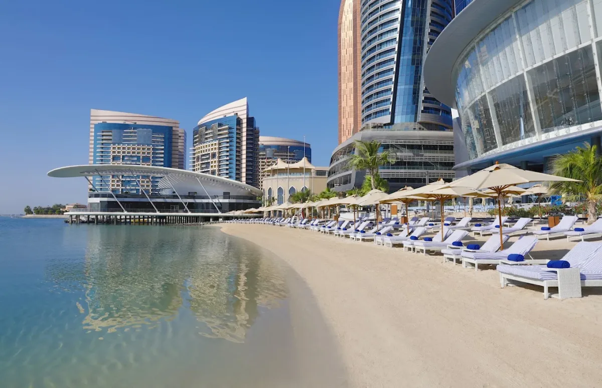 Poolside loungers and Gulf views at Conrad Abu Dhabi Etihad Towers, West Corniche