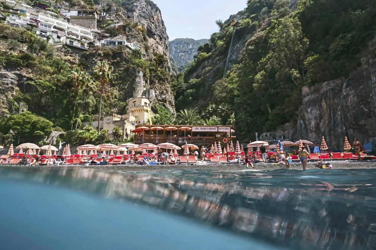 Orange sunbeds at Arienzo Beach Club, Positano