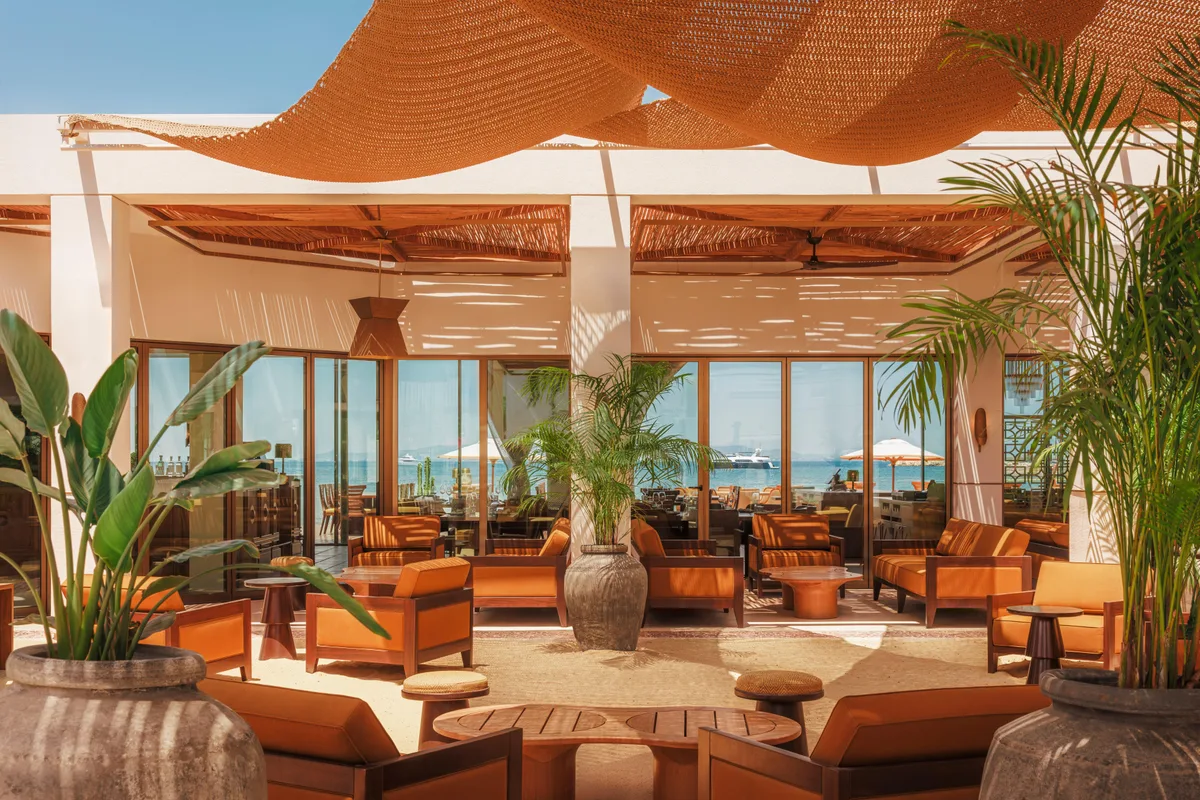 Golden sand and cabanas at Manko Beach Club, One&Only Aesthesis, Glyfada