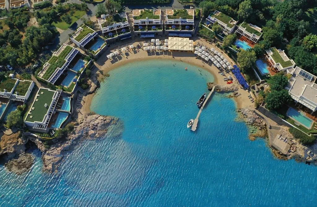 Uncrowded resort beach and VIP deck at Grand Beach, Lagonissi