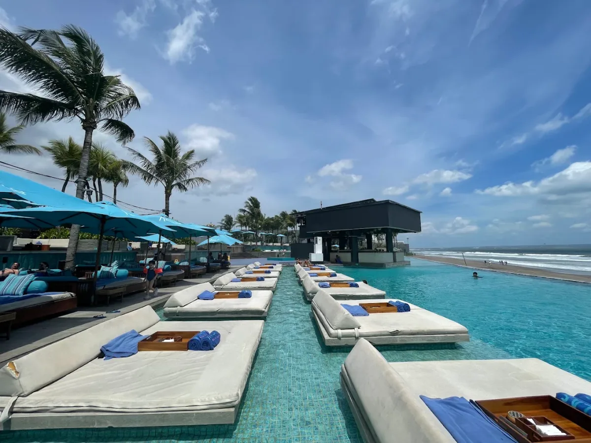 Long pool and standing bar at Atlas Beach Club, Berawa Beach