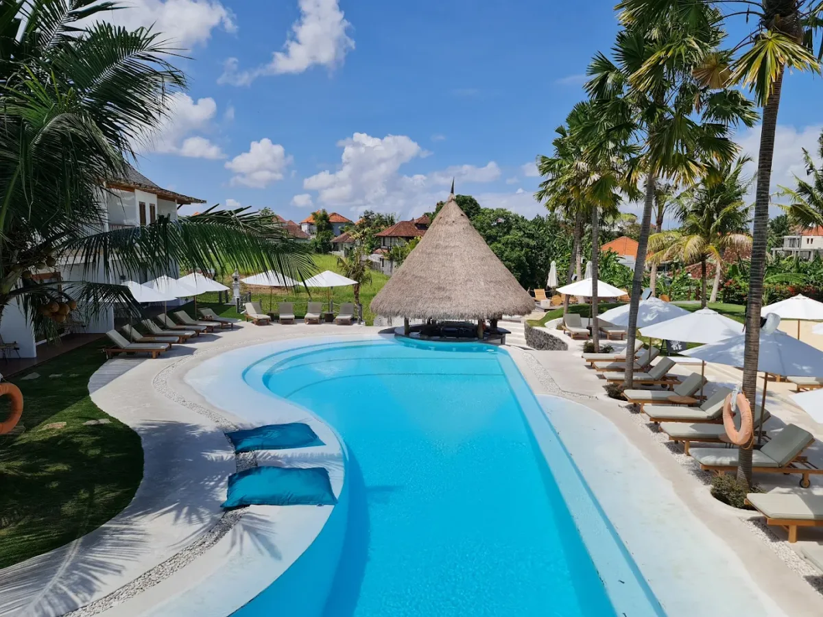 Open-air pool and daybeds at Alternative Beach, Batu Bolong Beach
