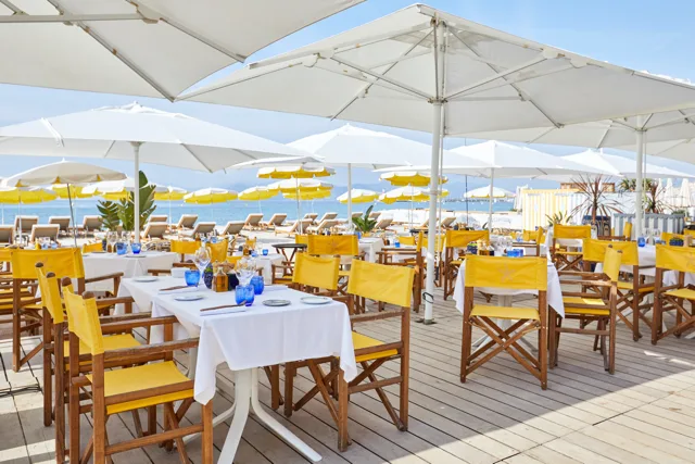 Sea-weathered wood and hand-painted tiles at Vilebrequin L'Ondine, La Croisette