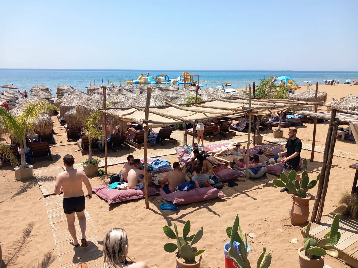 Free sunbeds and a big DJ party on the sand at Wave Beach Bar, Marathias Beach