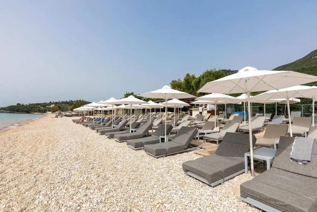 Plush pre-bookable sunbeds and DJ decks at Piedra del Mar, Barbati Beach