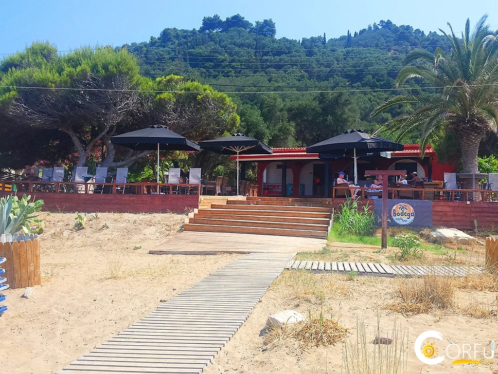 Sofas and sunbeds on the sand at Bodega Beach Bar, Kontogialos Beach