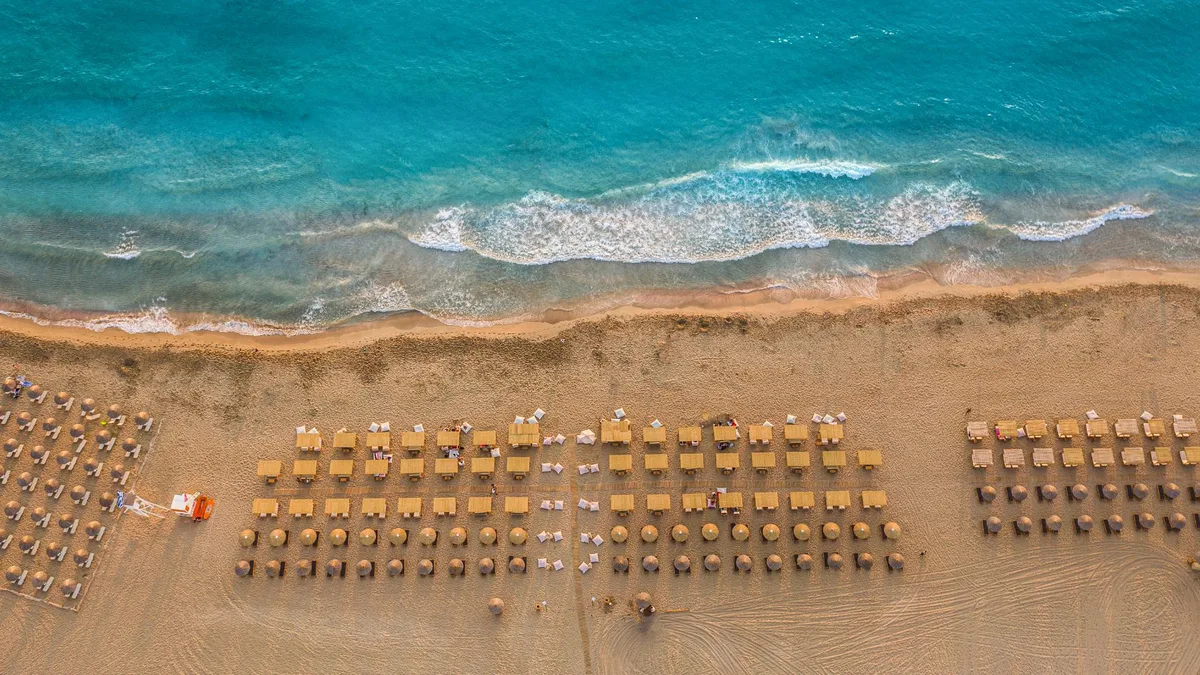 Boho cabanas at sunset on Falasarna beach, Liokalyvo