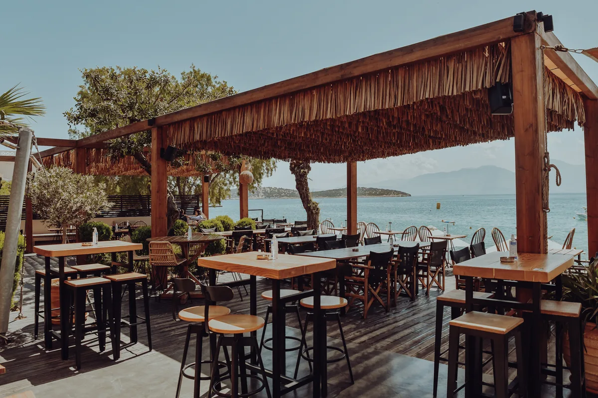 Hidden cove with sea views at Amoodi Beach Bar, Agios Nikolaos