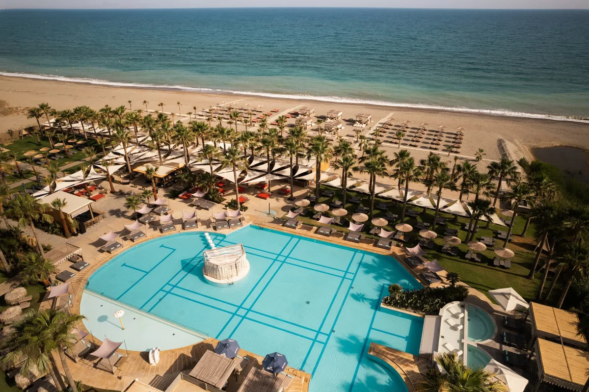 Large pool and gazebos at Baja Beach Club, Rethymno