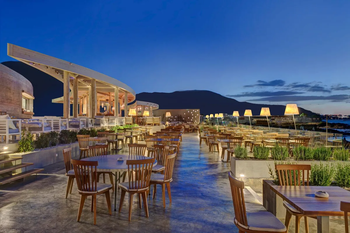 Loungers and cocktail bar at Beachcomber, Stalis