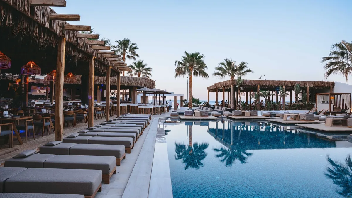 Poolside gazebos and dancefloor at Palm Beach Club, Hersonissos