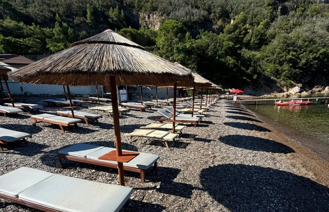 African reed umbrellas at Sunset Beach Club, Bagnaia