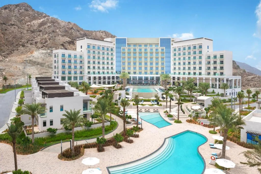 Cascading pools and private beach at Address Beach Resort Fujairah, Sharm