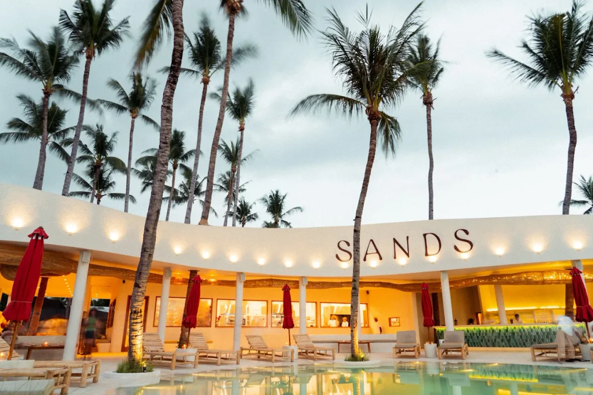 Poolside loungers and wood-fired grill at SANDS Beach Club, Gili Air