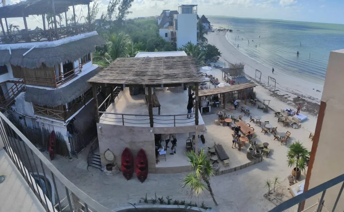 Sunset fire pits and loungers at Fuego Beach Club, AWA Hotel