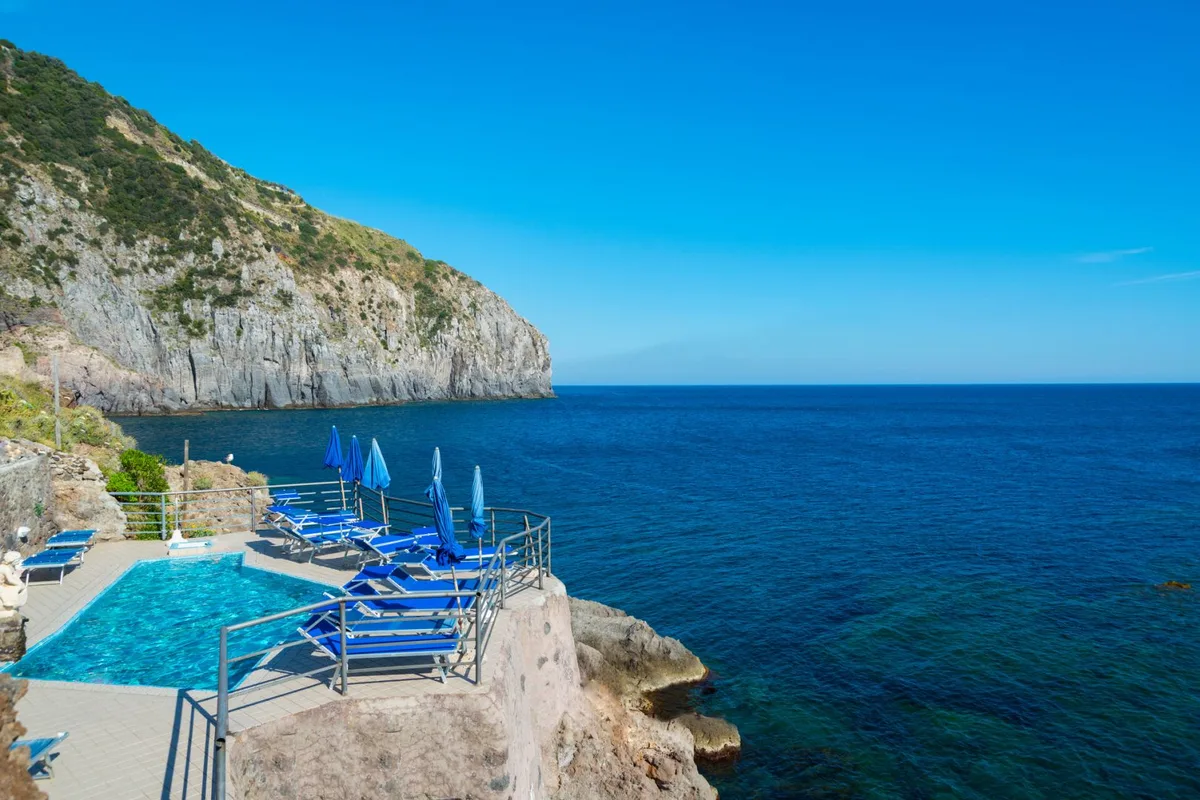 Warm rock pools in Scannella bay at Hotel Club Scannella, Panza