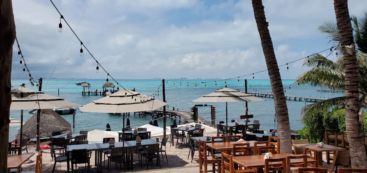 Swim-up bar and beach chairs on the Garrafon road at Kin Ha Beach Club