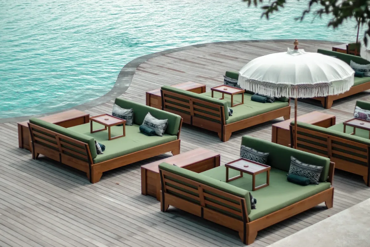 Clifftop infinity pool at sunset above Tegal Wangi at Locca Sea House, Jimbaran