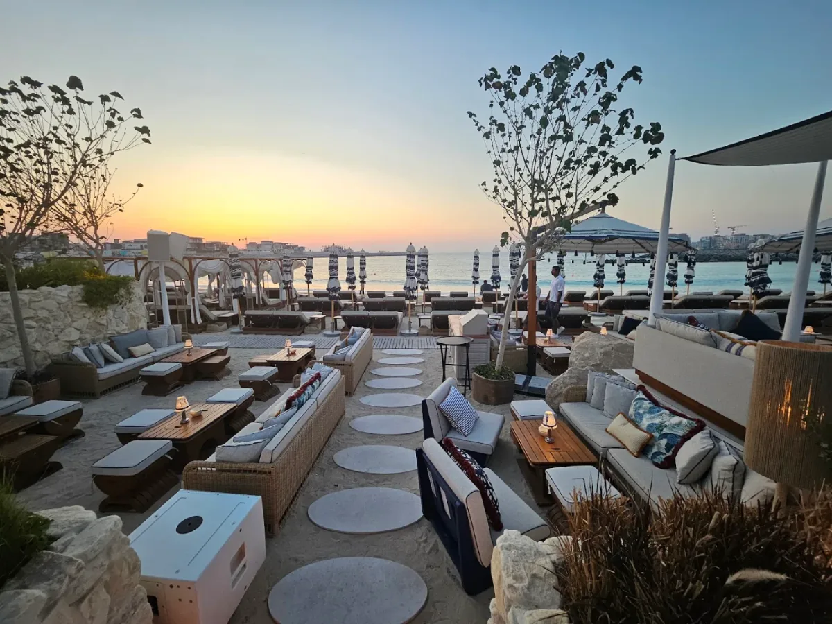 Poolside sunbeds and cabanas at Sirene Beach by Gaia, J1 Beach