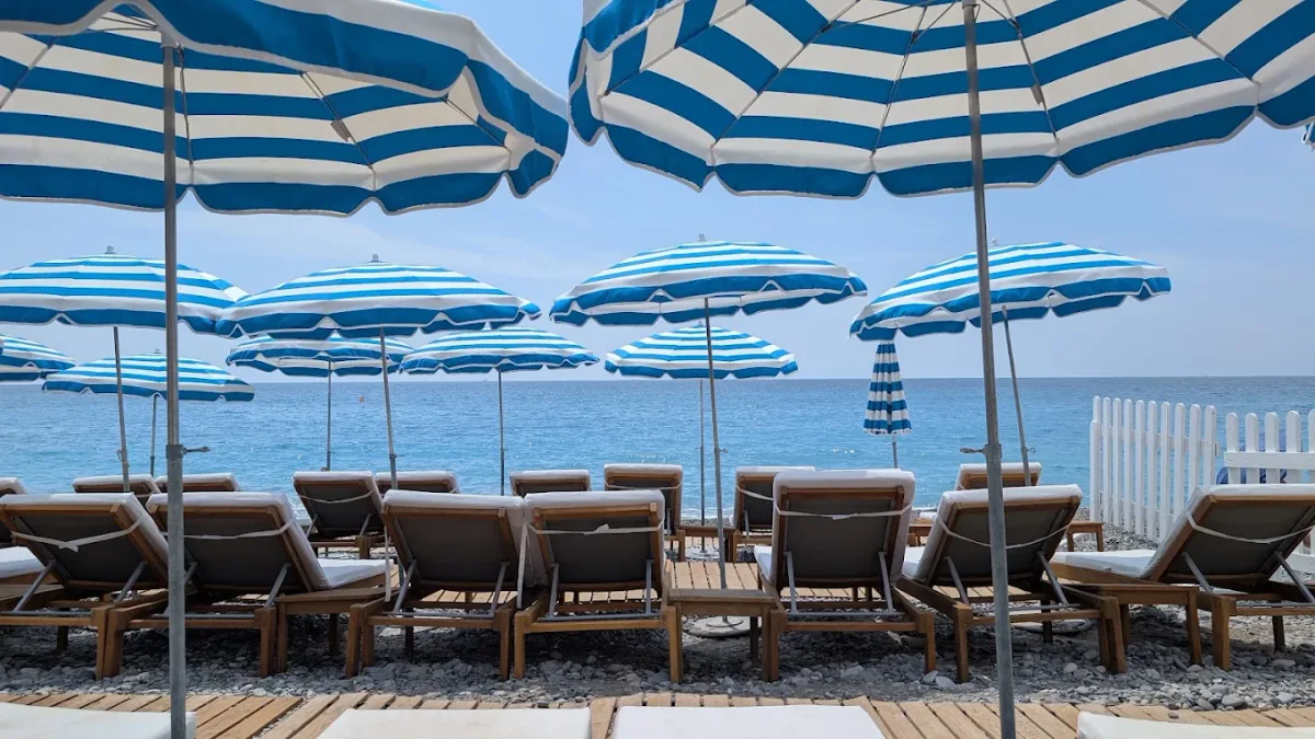 Cushioned loungers on the pebble beach at Cocoon Beach, Promenade des Anglais, Nice