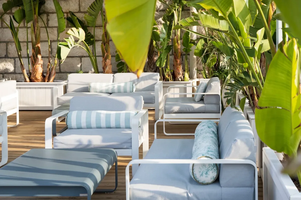 Whitewashed furniture and a kids' play area at N La Plage, the Negresco's beach in Nice