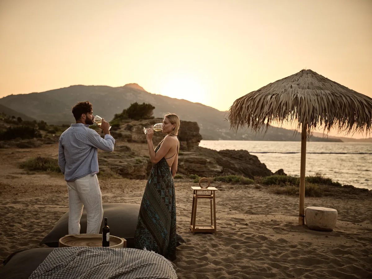 Beachfront loungers and fine dining at RADA, Agioi Anargyri Beach near Naoussa