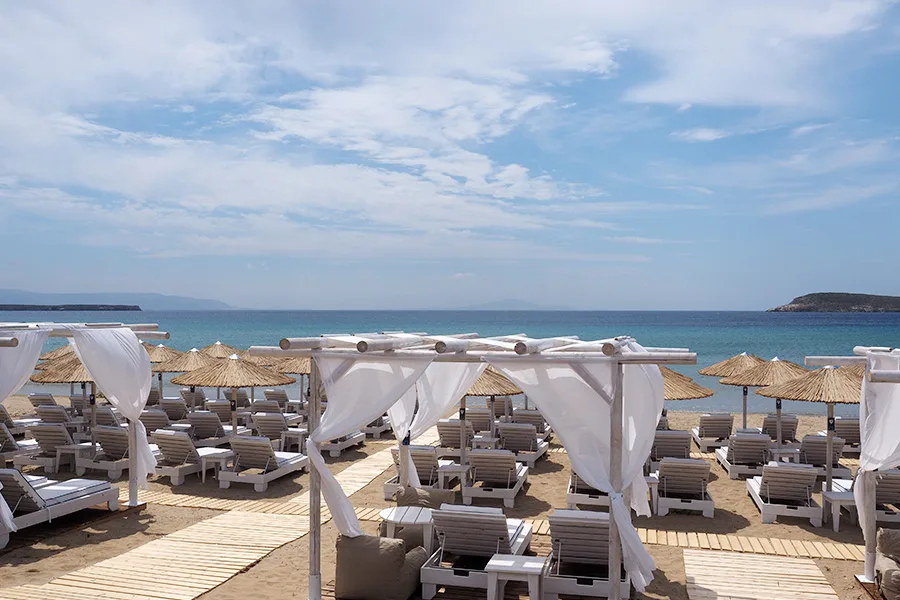 Bean-bag cabanas stepping down over the sand at Sal Y Mar Beach Lounge, Golden Beach