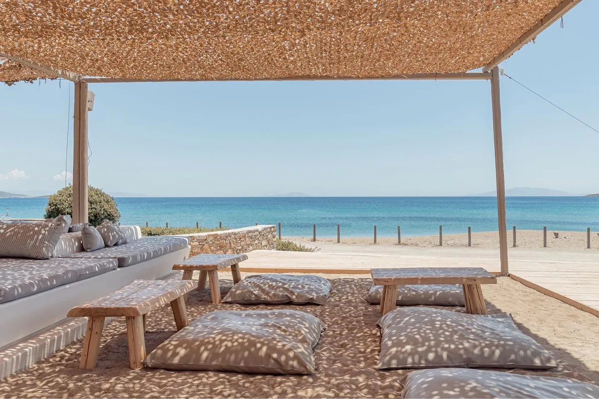 Low-key loungers in a rocky cove at Anemos Beach Bar, Kolymbithres Beach
