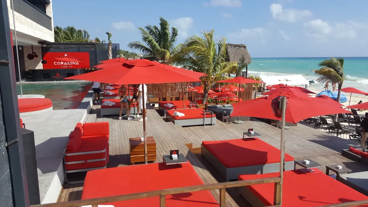 Infinity pool over the sand with plush daybeds at Coralina Daylight Club, Grand Hyatt