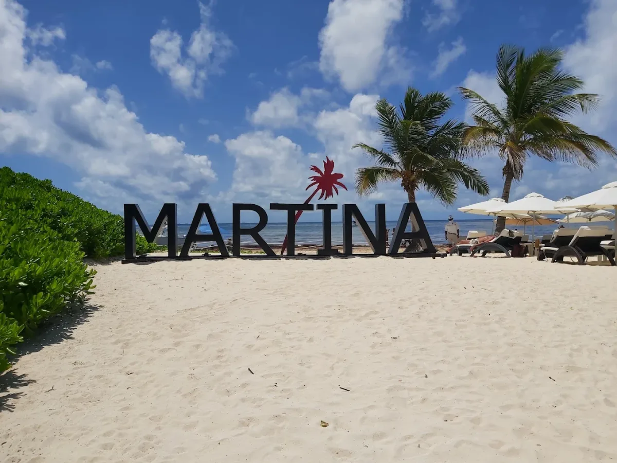 Pool and private beach loungers at Martina Beach Club, Coco Beach