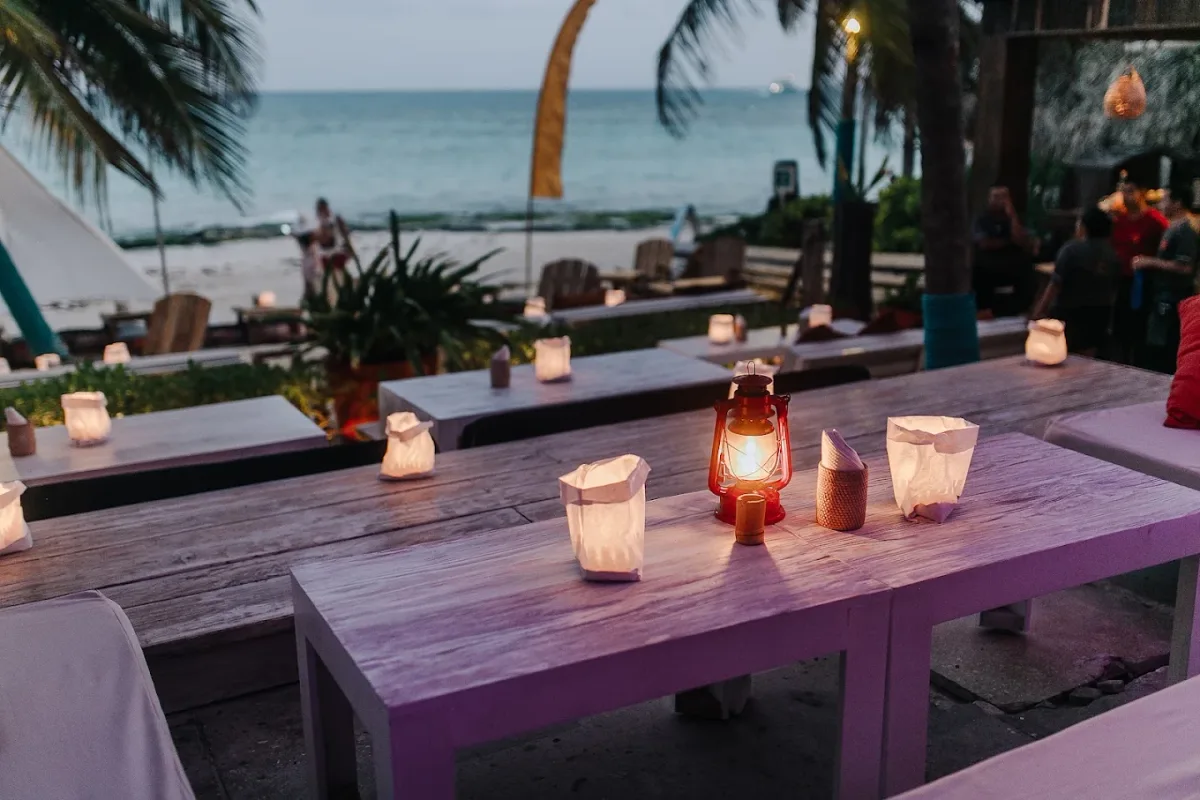 Yoga deck and beach loungers at INTI Beach, between Calle 4 and 6