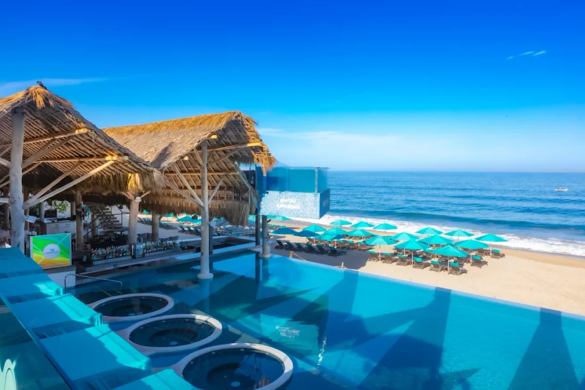 Infinity pool and DJ deck at Mantamar Beach Club, Los Muertos Beach