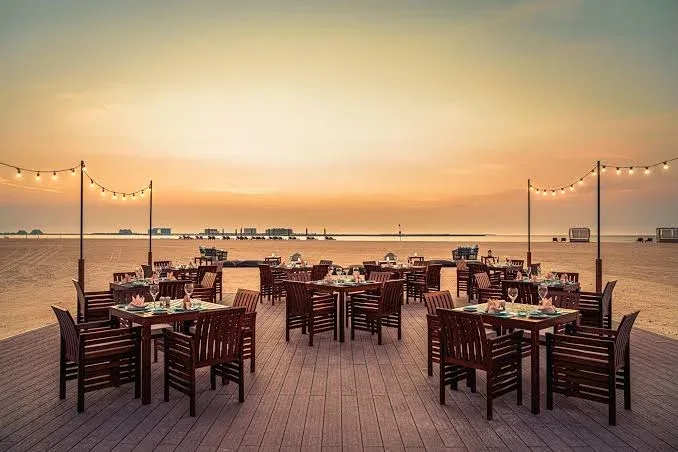 Shore House infinity pool and private beach at The Ritz-Carlton, Al Hamra Beach