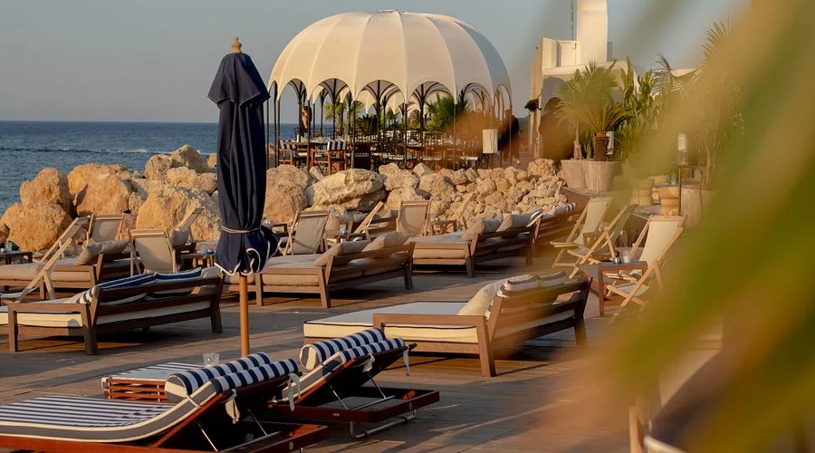 Sunbeds and sunset dining at NOR Beach House Project, northern tip of Rhodes Town