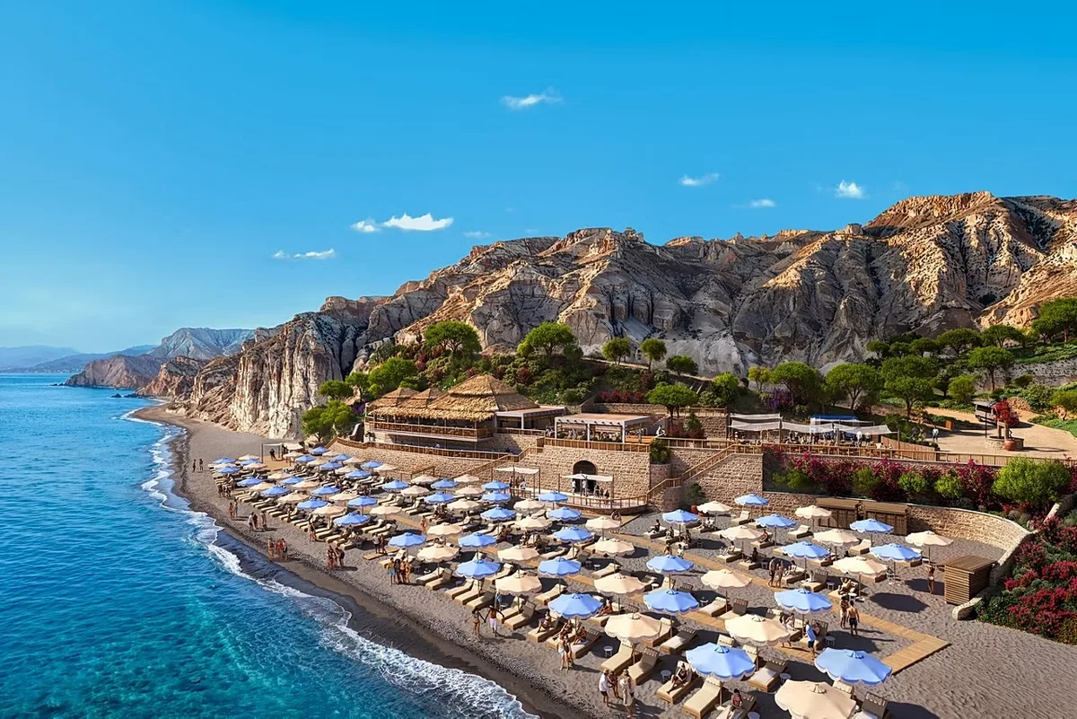 Private black-sand beach and buffet terrace at Royal Beach Club Santorini, Vlychada