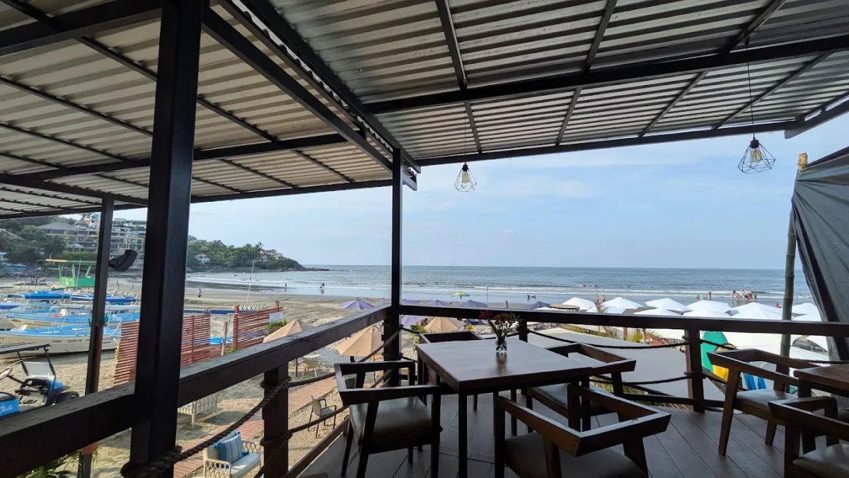Beachfront loungers and surf boards at The Dock Sayulita, Sayulita main beach