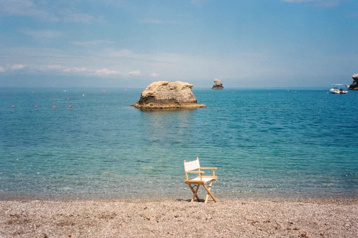 Canopied loungers and cabanas at Lido Villeggiatura, Mazzarò Bay